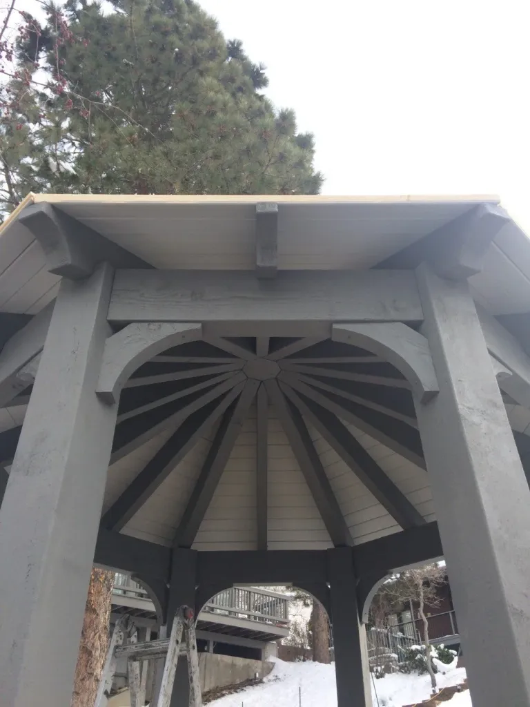 Custom timber gazebo highlighting the best wood for a gazebo with exposed beams, sturdy posts, and durable craftsmanship.