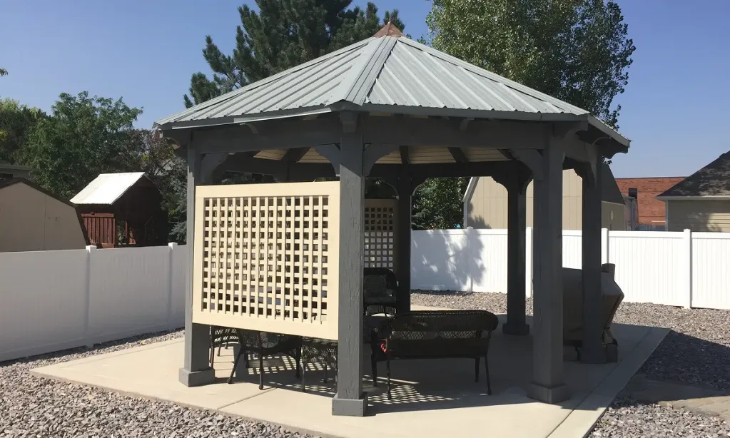 Backyard Gazebo on Concrete Patio in Utah Backyard timber gazebo on a concrete patio showing the type homeowners ask about when asking do you need a permit for a gazebo.